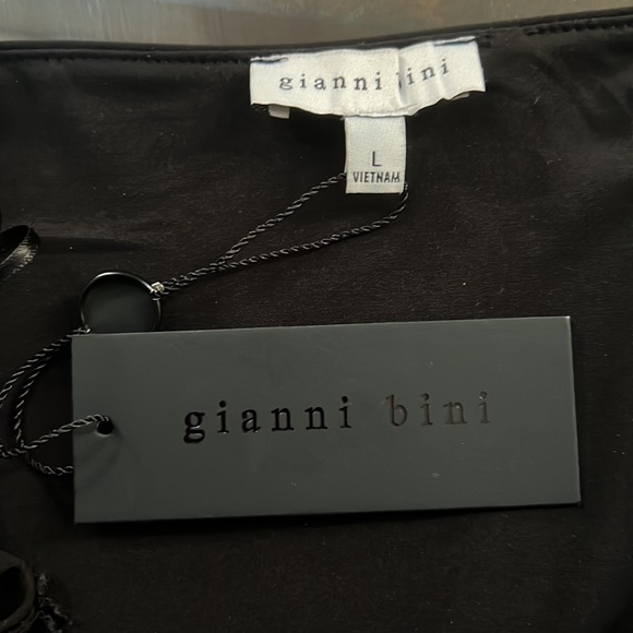 Gianni Bini
Bedford Side Cut Out Scoop Neck Sleeveless Dress - Picture 9 of 10